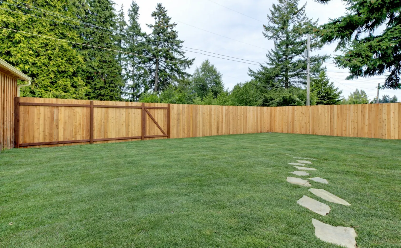 Empty backyard space before detached ADU construction in Dallas