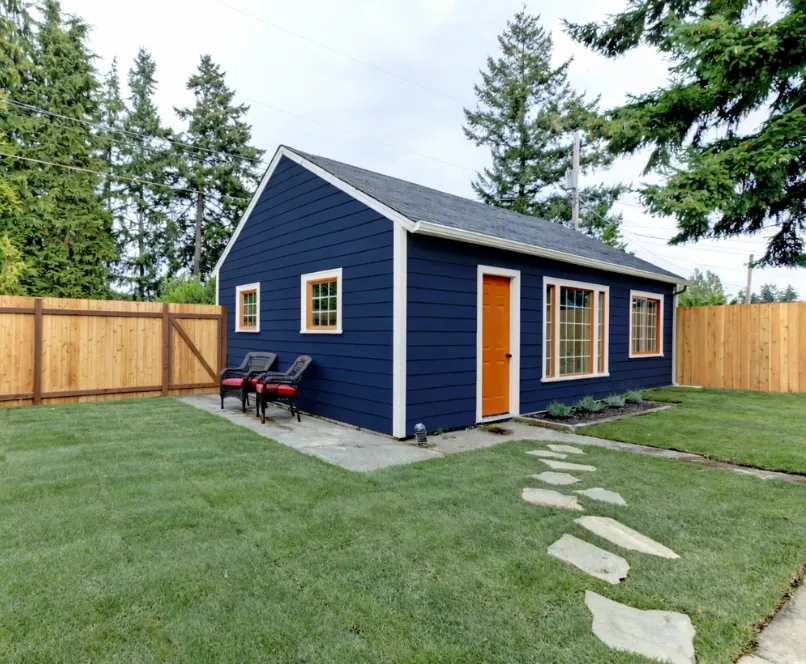 Detached ADU backyard home with private entrance and modern windows built for rental or guest living space in Dallas TX