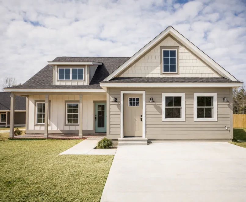 Garage conversion ADU transformed into a modern backyard living unit with new siding, windows, and private entry in Dallas Texas